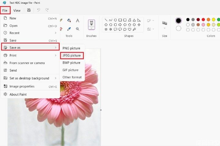 在“画图”应用中选择“文件”并另存为。